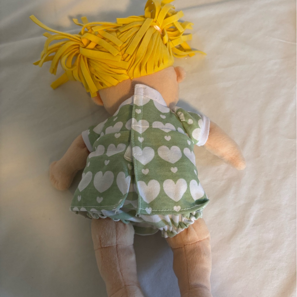Manhattan Toy Plush Baby Doll in Green Heart Dress - Soft Toy for Kids - Picture 3 of 4